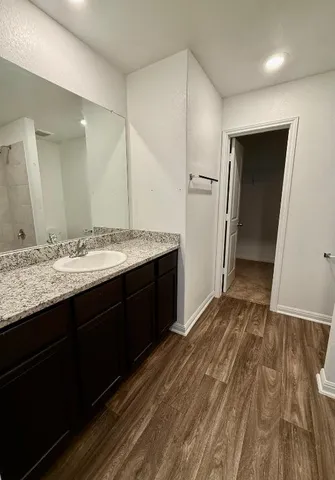 a view of an empty room with closet area