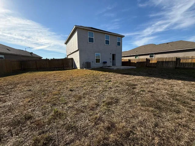 a view of a room with a rug