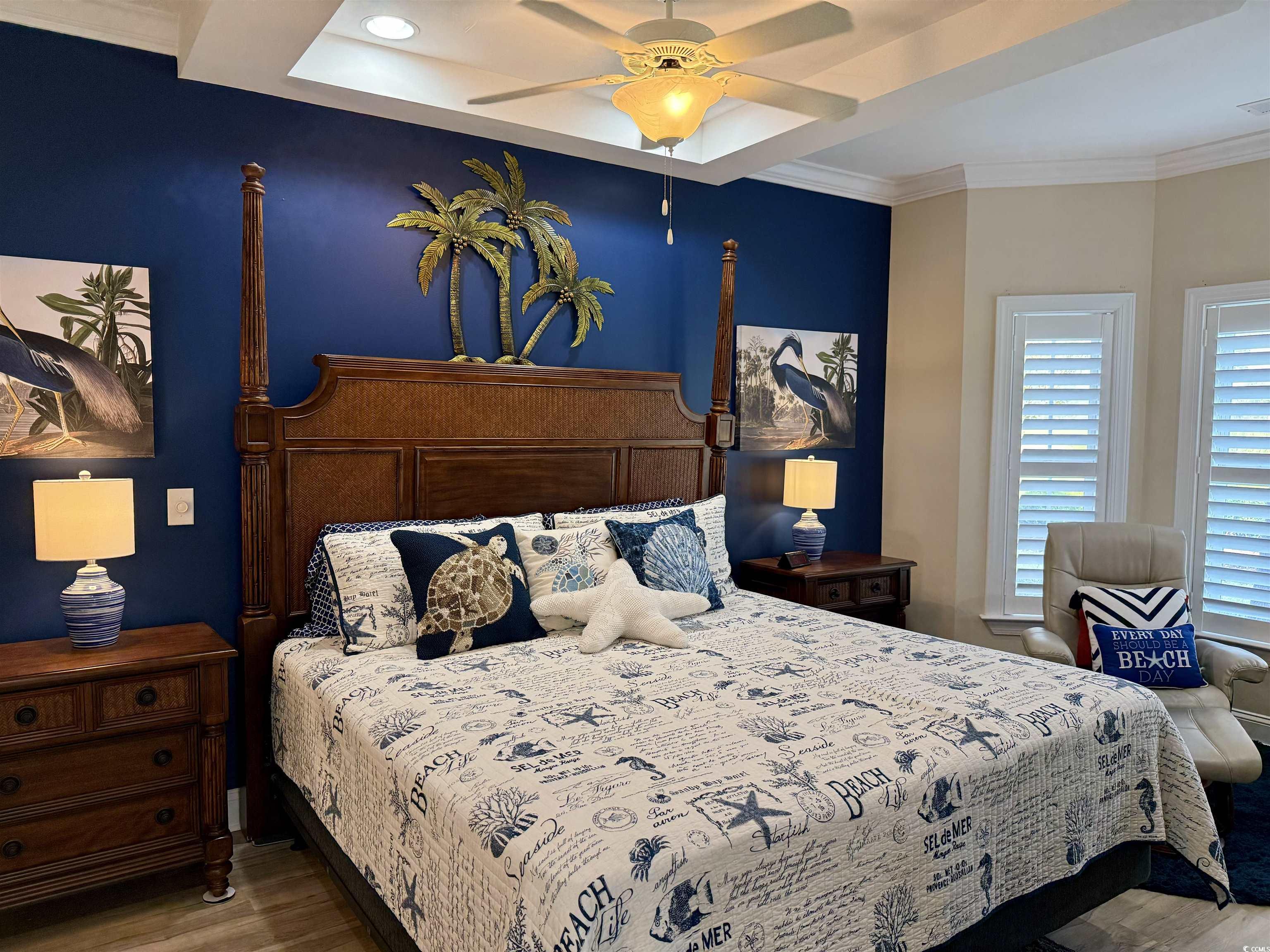 1008 Ray Costin Way, Unit 305 Murrells Inlet, SC 29576 - Photo 18 of 31 Bedroom with ceiling fan, ornamental molding, and