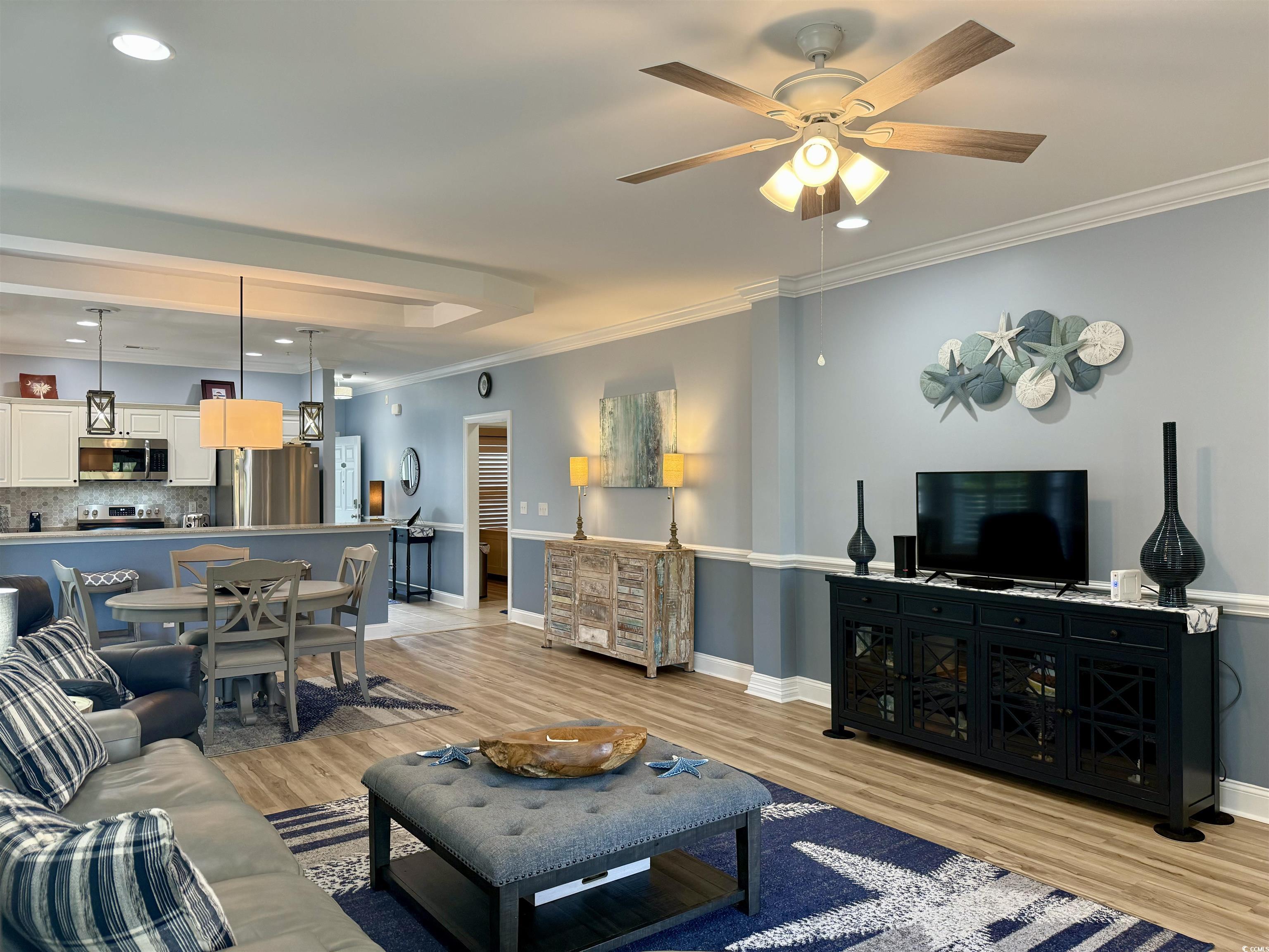 1008 Ray Costin Way, Unit 305 Murrells Inlet, SC 29576 - Photo 23 of 31 Living room featuring light hardwood / wood-style