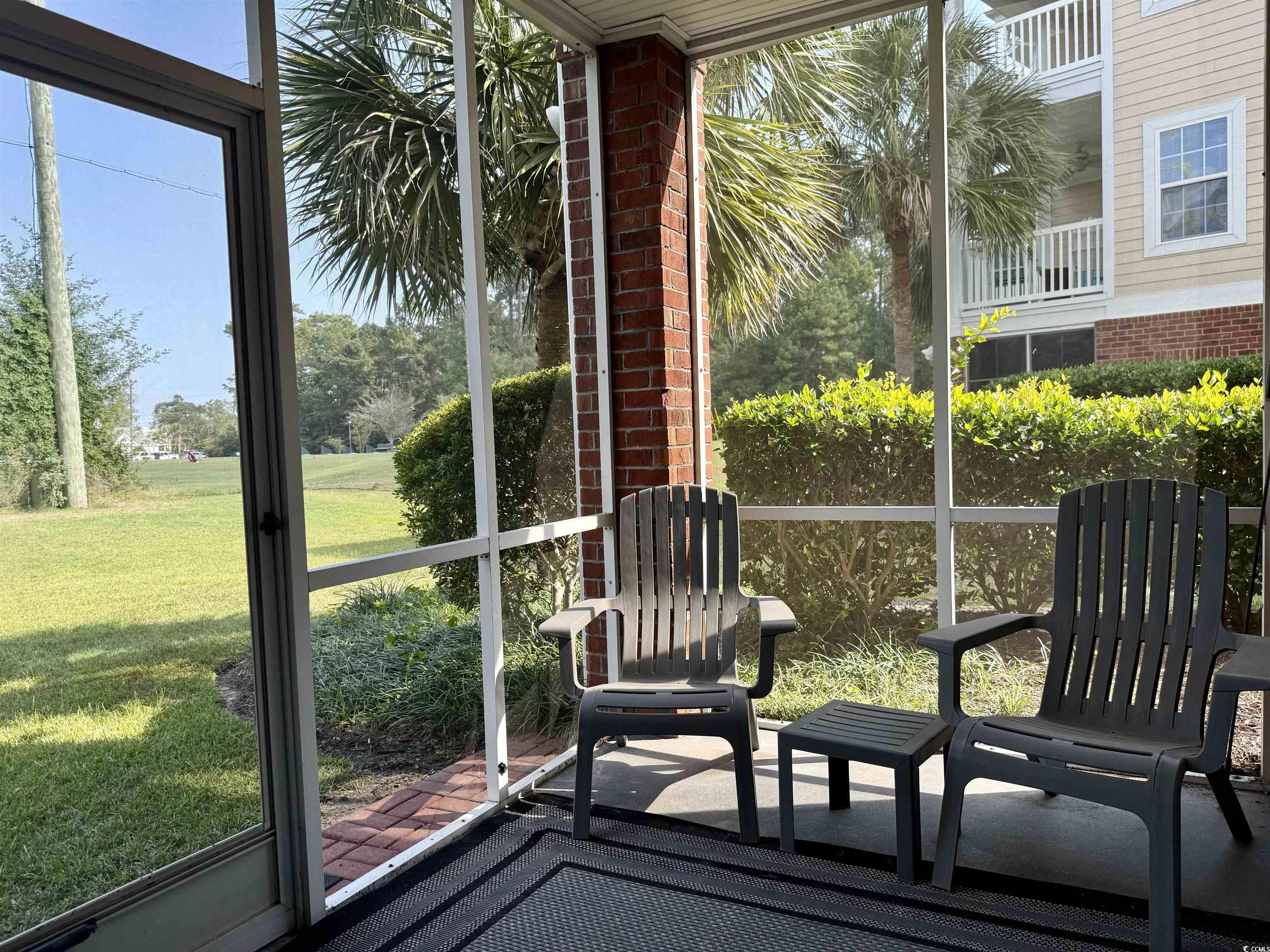 1008 Ray Costin Way, Unit 305 Murrells Inlet, SC 29576 - Photo 26 of 31 View of sunroom