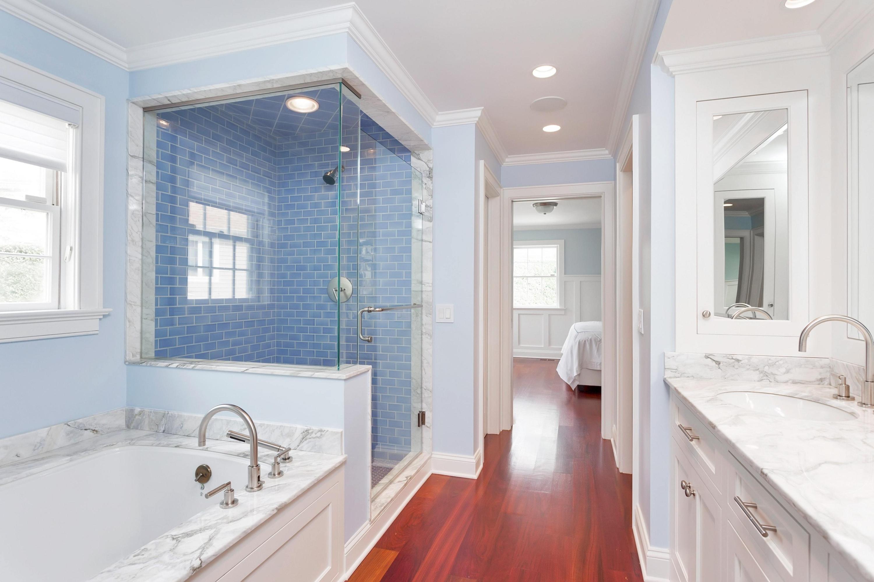 31 Meridian Road Rowayton, CT 06853 - Photo 11 of 18 a en suite bathroom with a granite countertop tub sink and mirror