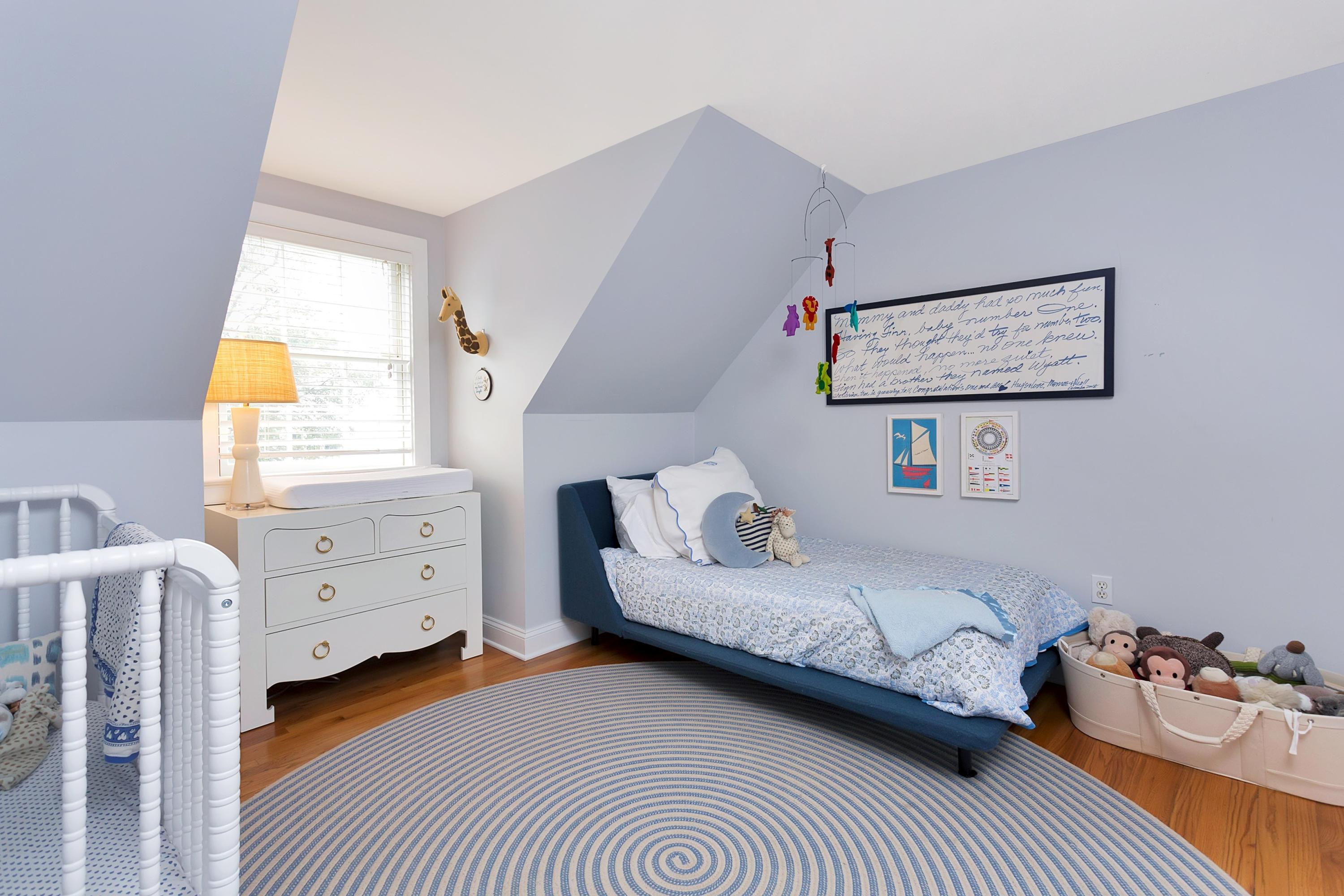 31 Meridian Road Rowayton, CT 06853 - Photo 12 of 18 a bedroom with a bed and a window