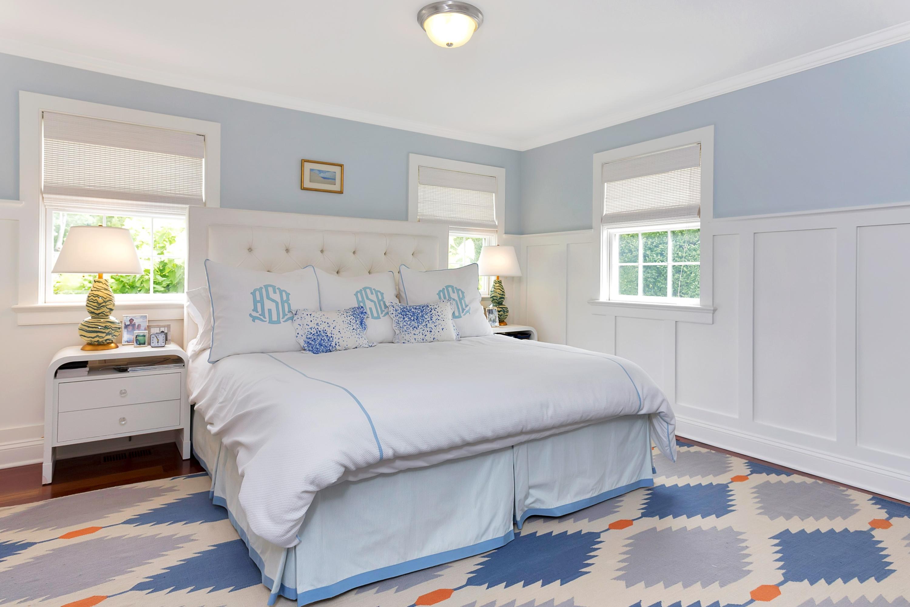 31 Meridian Road Rowayton, CT 06853 - Photo 10 of 18 a bedroom with a bed and wooden floor