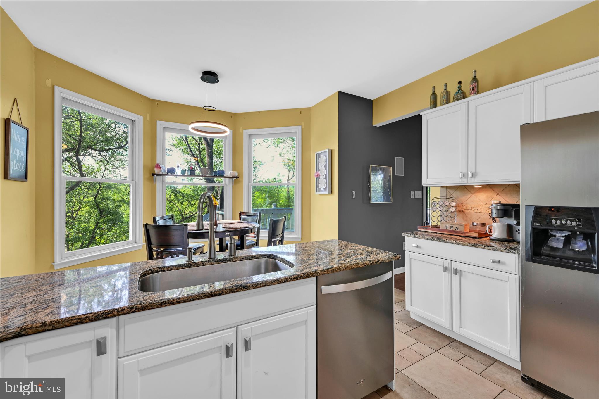1602 Churchill Road Harrisburg, PA 17111 - Photo 24 of 61 a kitchen with granite countertop a sink and white cabinets