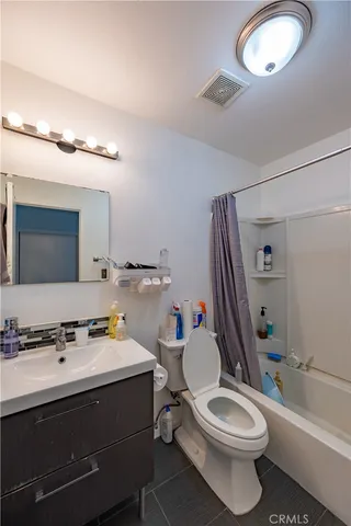 a front view of a house with a patio