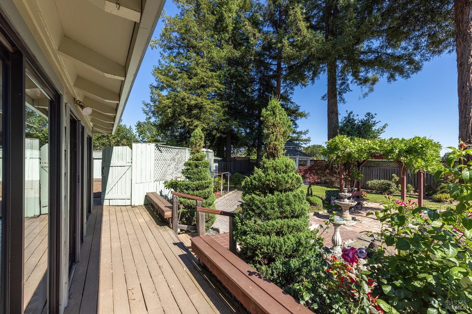 2236 West Hearn Avenue Santa Rosa, CA 95407 - Photo 50 of 56 a view of balcony with chairs and wooden fence