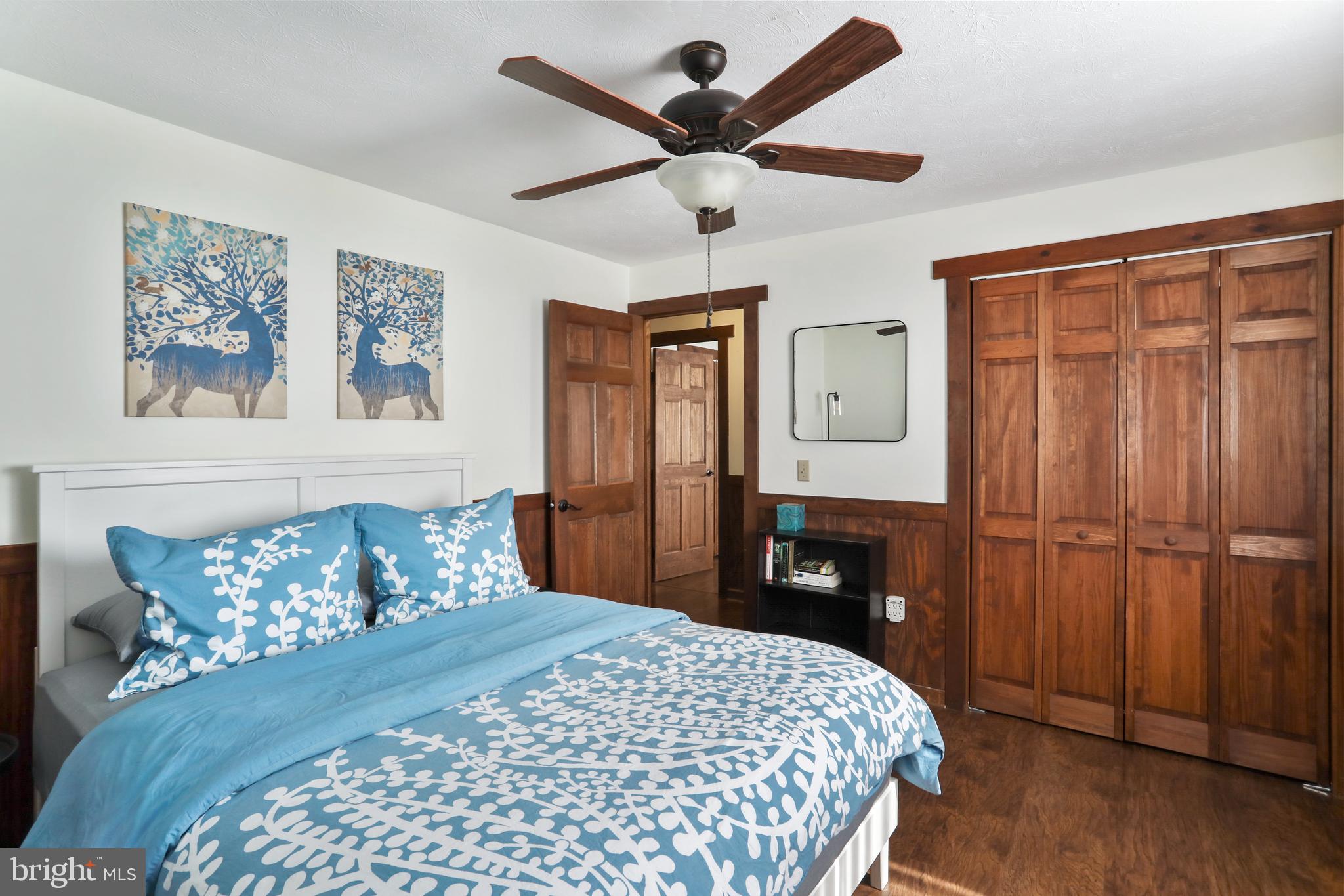 8249 Supinlick Ridge Road Mount Jackson, VA 22842 - Photo 29 of 40 a bedroom with a bed dresser and a window