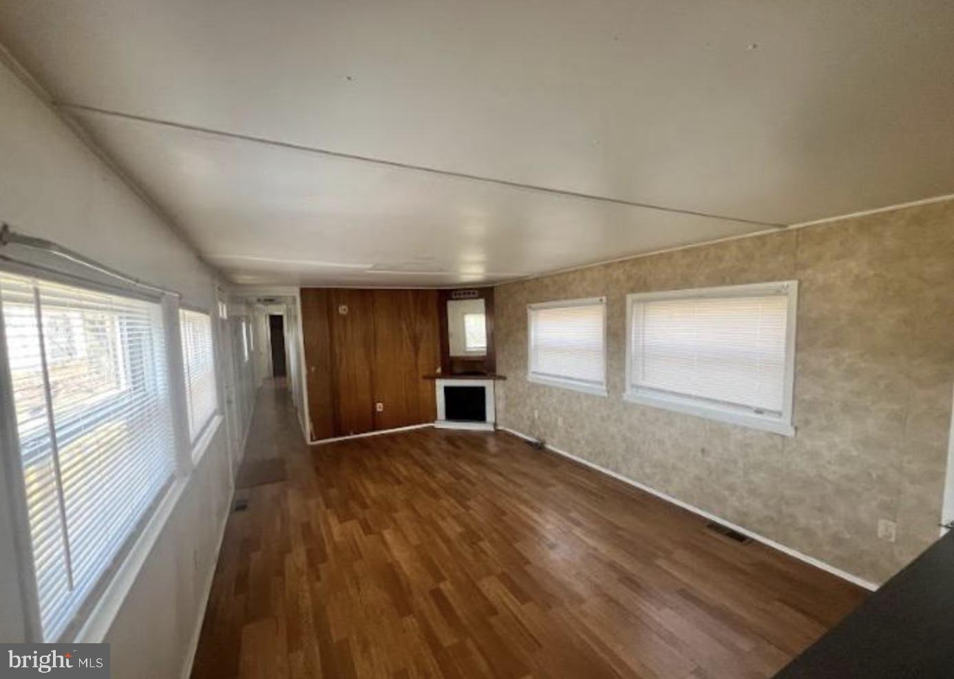 236 South Tuckahoe Road Williamstown, NJ 08094 - Photo 19 of 27 an empty room with wooden floor and windows