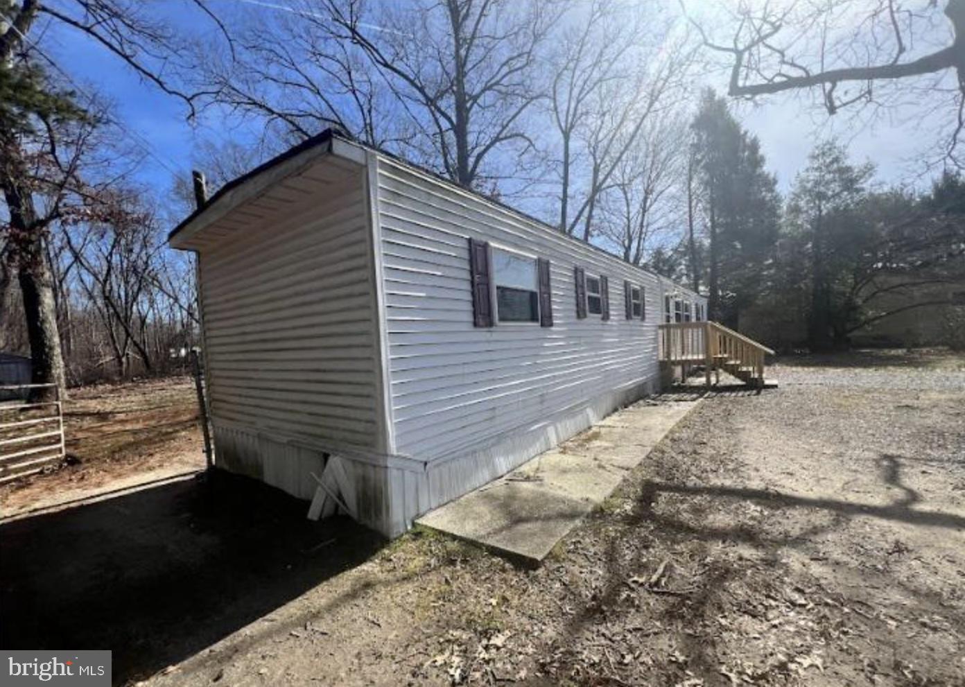 236 South Tuckahoe Road Williamstown, NJ 08094 - Photo 24 of 27 a view of a backyard with a large tree