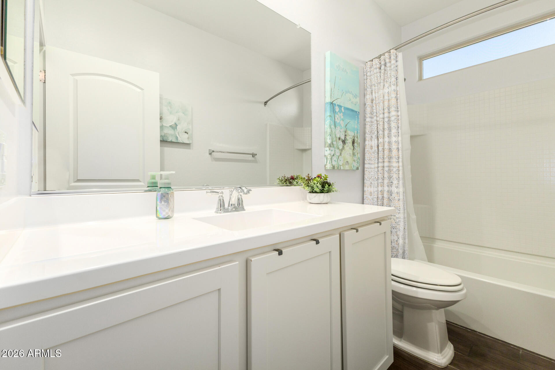 41039 West Williams Way Maricopa, AZ 85138 - Photo 18 of 25 a bathroom with a sink a toilet and shower