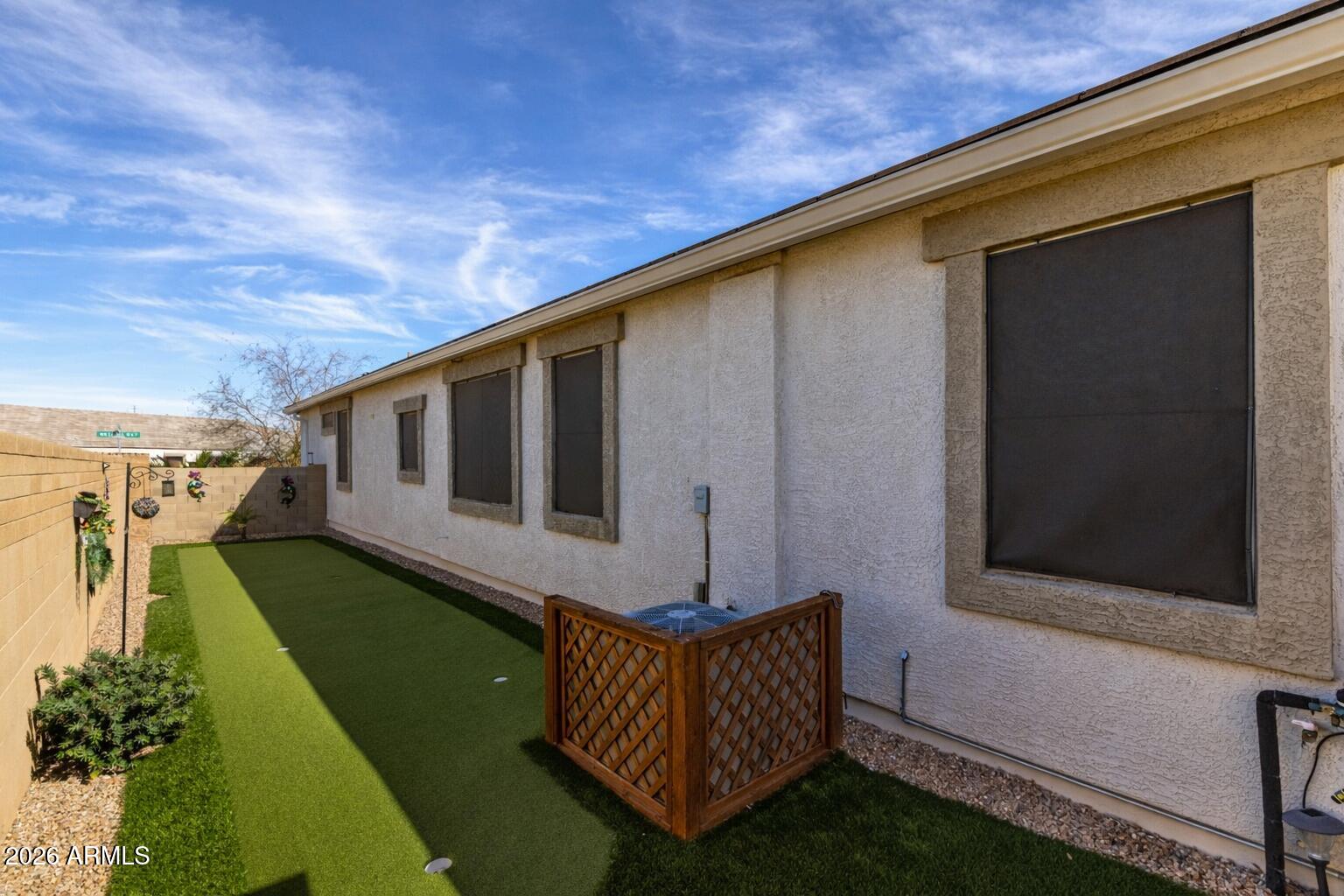41039 West Williams Way Maricopa, AZ 85138 - Photo 22 of 25 a view of a backyard with sitting area