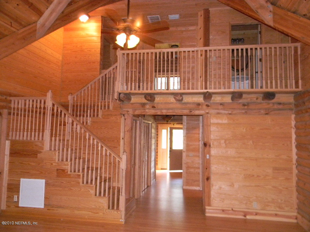 172 Ranchette Lane Florahome, FL 32140 - Photo 4 of 9 STAIRS FROM LIVING ROOM