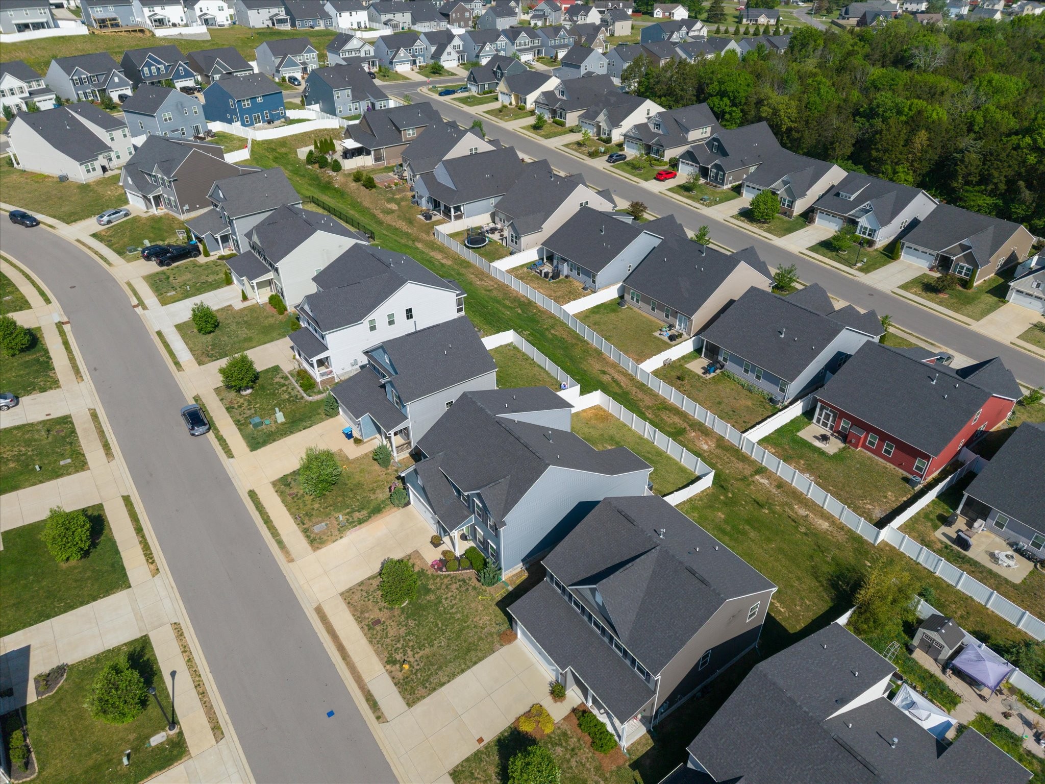 910 Caywood Road Smyrna, TN 37167 - Photo 43 of 49 an aerial view of a residential apartment building with a yard