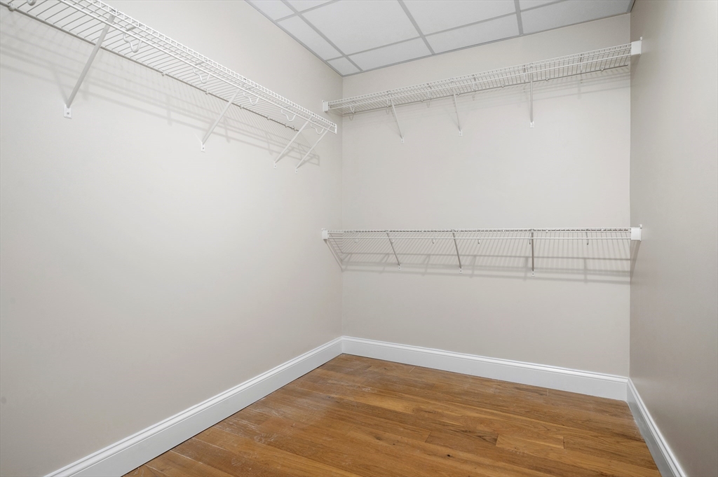 36 Old Louisquisset Pike, Unit 106 North Smithfield, RI 02896 - Photo 18 of 30 a view of a room with racks on the wall