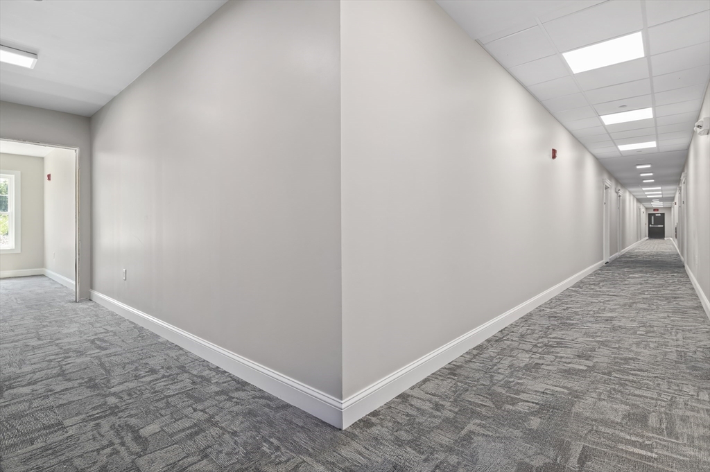 36 Old Louisquisset Pike, Unit 106 North Smithfield, RI 02896 - Photo 28 of 30 a view of hallway