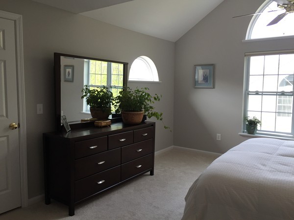 16 Centerview Road, Unit 16 Atkinson, NH 03811 - Photo 10 of 12 a bedroom with a bed and a dresser