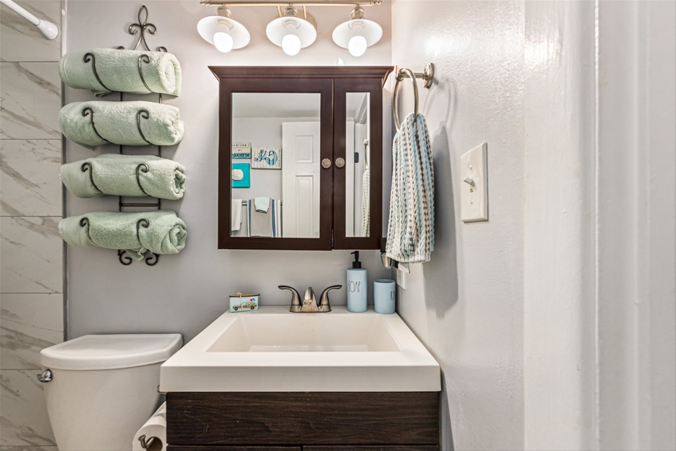 11945 Termini-San Luis Pass Road, Unit 406 Galveston, TX 77554 - Photo 23 of 26 Full bath featuring vanity and toilet