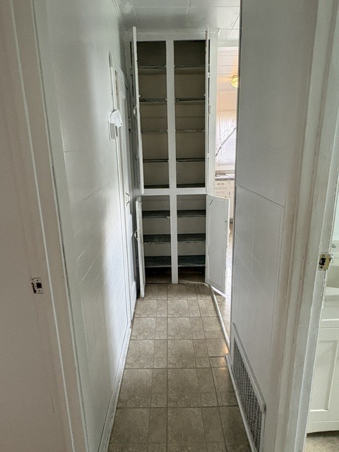 3S471 Pattermann Road Warrenville, IL 60555 - Photo 11 of 18 a view of closet area with rug