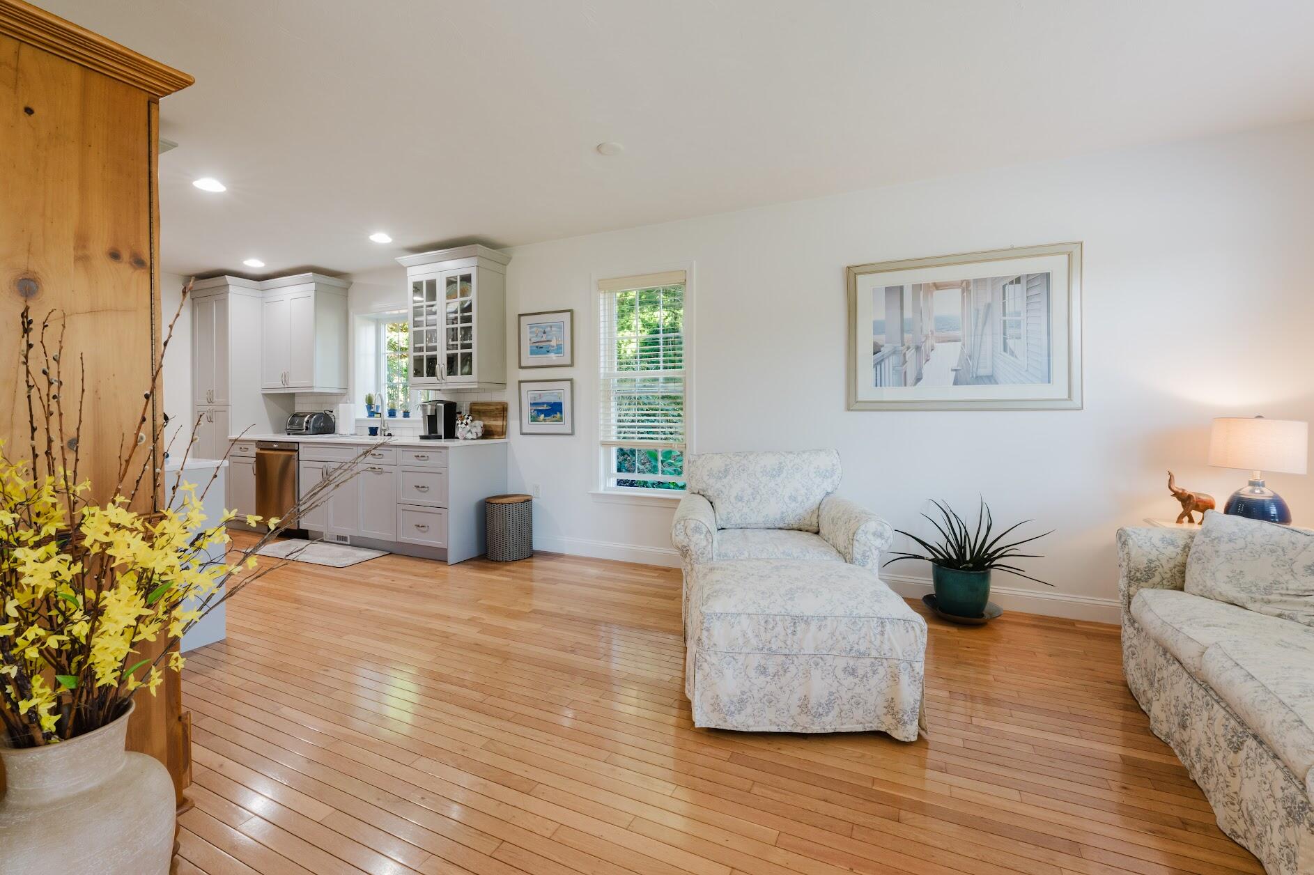 22 Stratford Ridge, Unit 22 Mashpee, MA 02649 - Photo 12 of 40 a living room with furniture and a large window