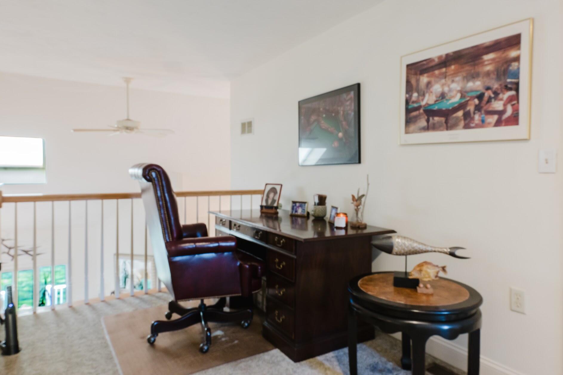 22 Stratford Ridge, Unit 22 Mashpee, MA 02649 - Photo 31 of 40 a view of a workspace with furniture and a window