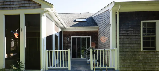a view of a house with a small porch