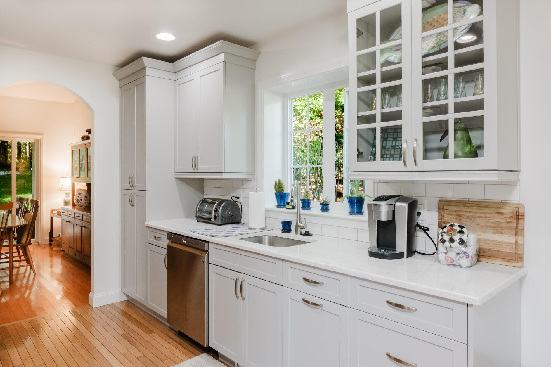 22 Stratford Ridge, Unit 22 Mashpee, MA 02649 - Photo 7 of 40 a kitchen with a sink and a window