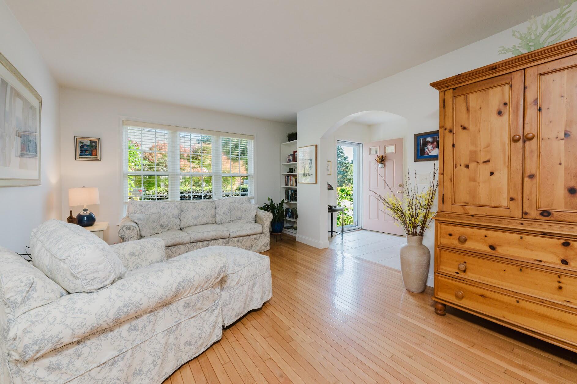 22 Stratford Ridge, Unit 22 Mashpee, MA 02649 - Photo 10 of 40 a living room with furniture and wooden floor