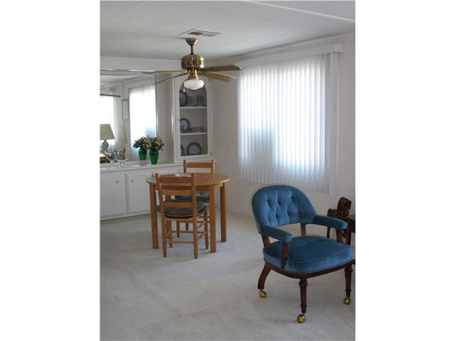 7467 Mission Gorge Road, Unit 83 Santee, CA 92071 - Photo 11 of 24 Seating area on other side of sofa
