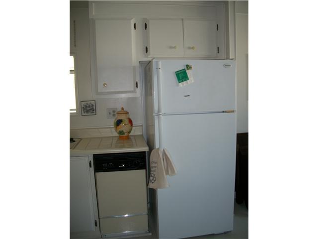 7467 Mission Gorge Road, Unit 83 Santee, CA 92071 - Photo 7 of 24 Dishwasher & refrigerator