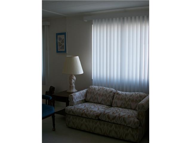 7467 Mission Gorge Road, Unit 83 Santee, CA 92071 - Photo 8 of 24 Sofa in front of picture window