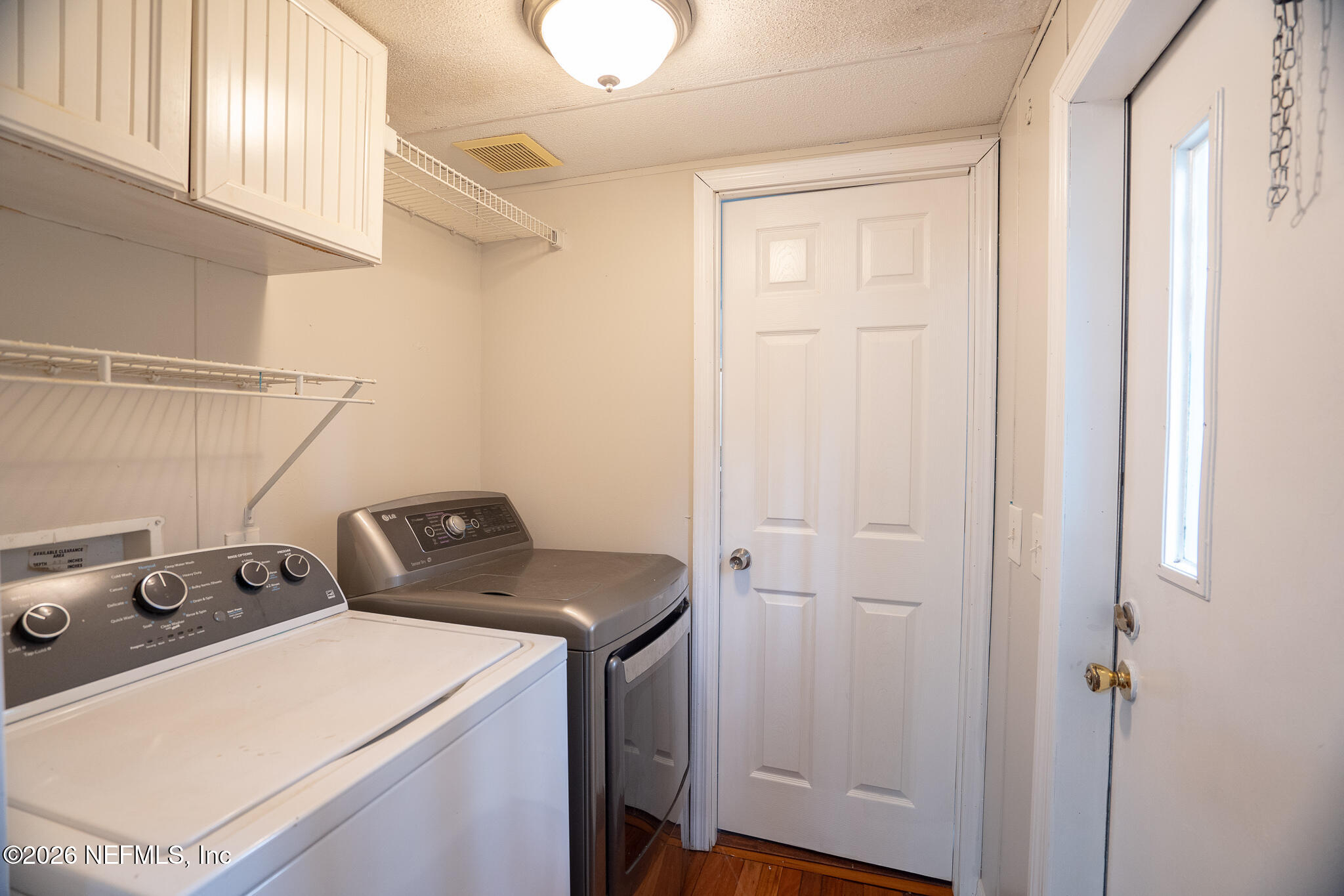 3180 Pacetti Road, Unit A St. Augustine, FL 32092 - Photo 14 of 23 a utility room with dryer and washer