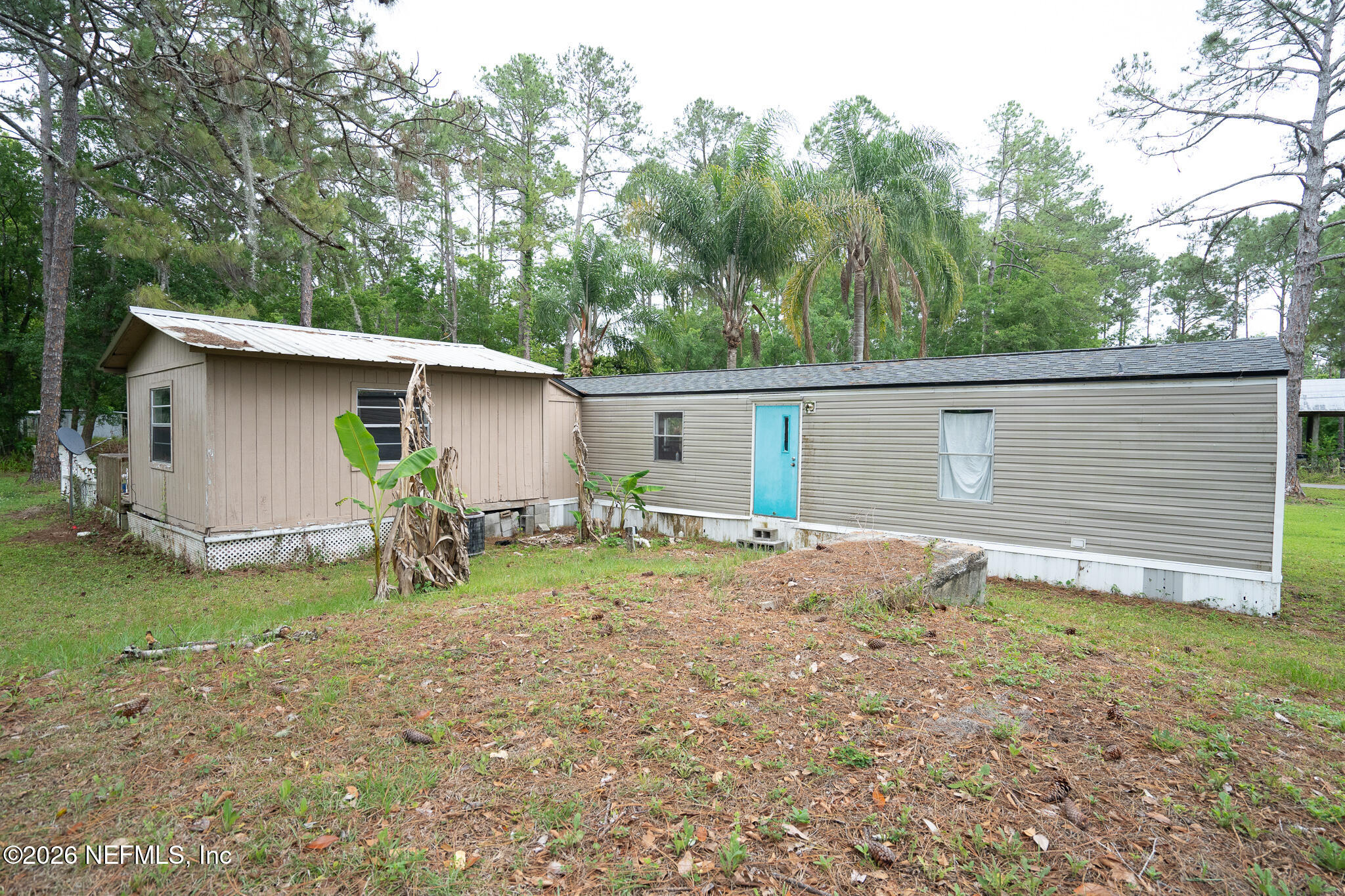 3180 Pacetti Road, Unit A St. Augustine, FL 32092 - Photo 6 of 23 a view of a house with backyard