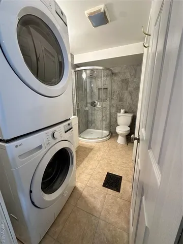 a bathroom with a toilet and a sink