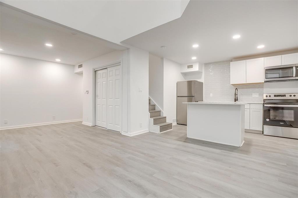 7900 Brookriver Drive, Unit 1216 Dallas, TX 75247 - Photo 1 of 1 a view of kitchen electric appliances and cabinets