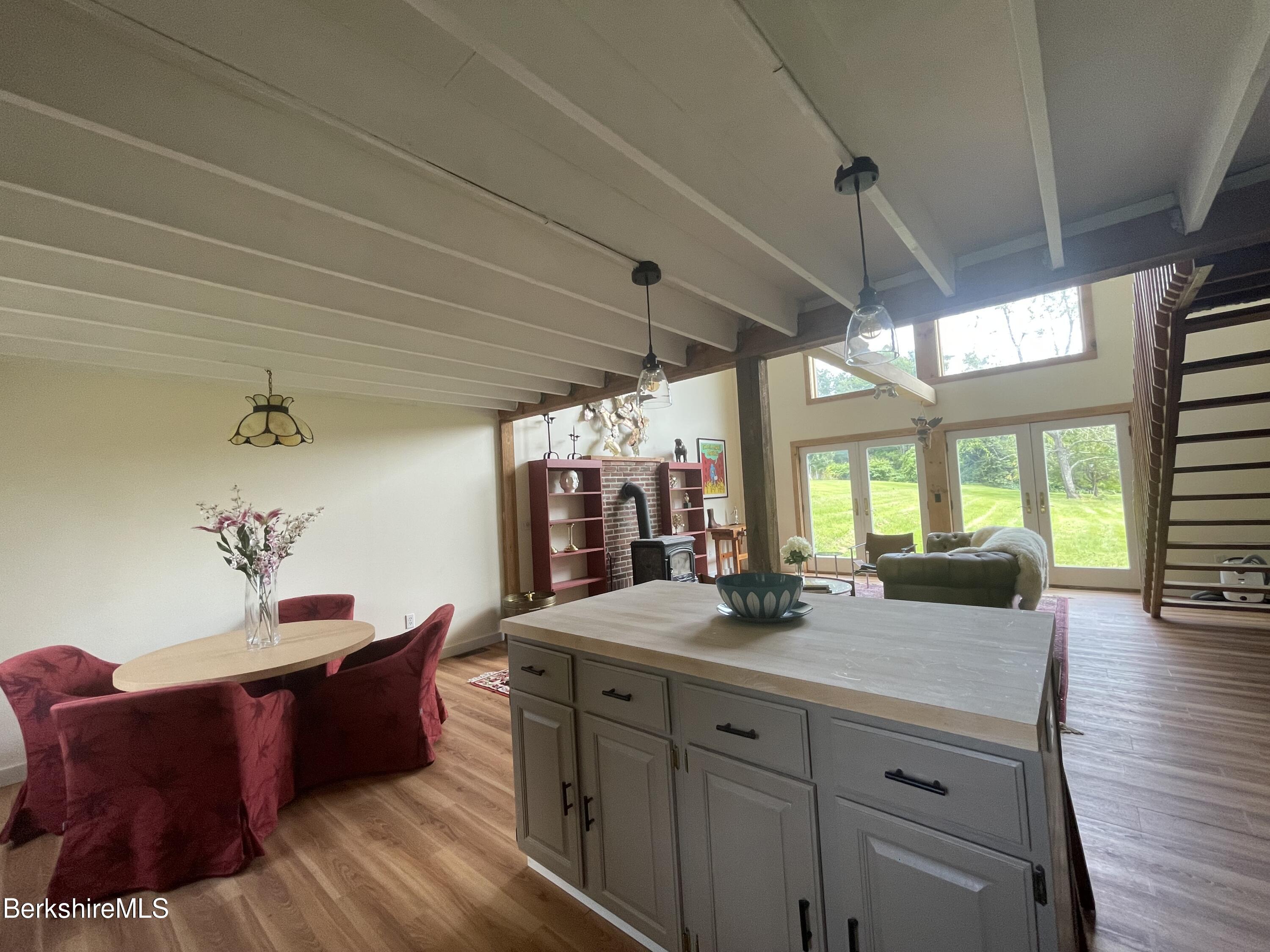 259 Salisbury Road Sheffield, MA 01257 - Photo 24 of 51 a room with granite countertop furniture and a large window