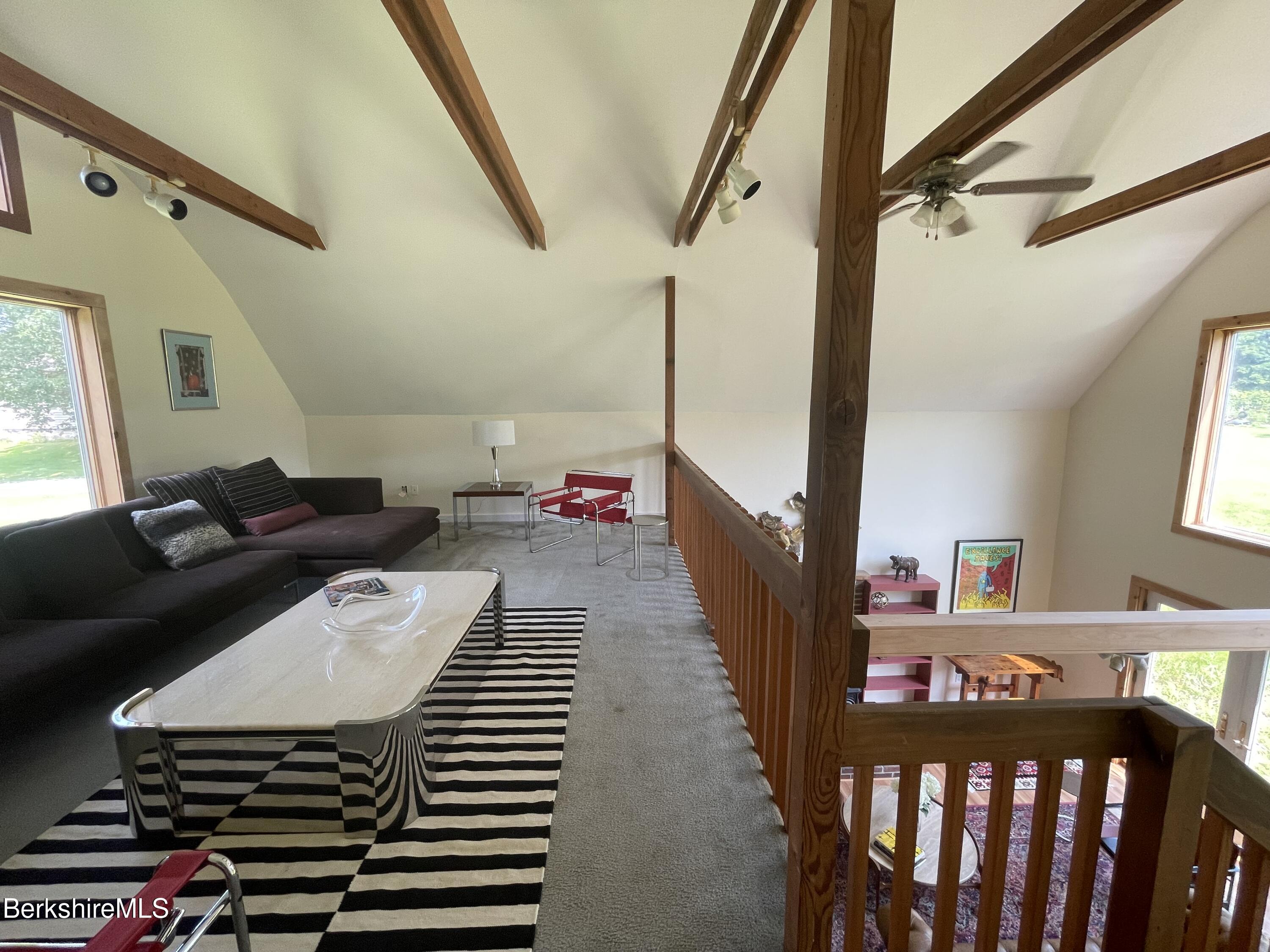 259 Salisbury Road Sheffield, MA 01257 - Photo 31 of 51 a living room with furniture and a wooden floor