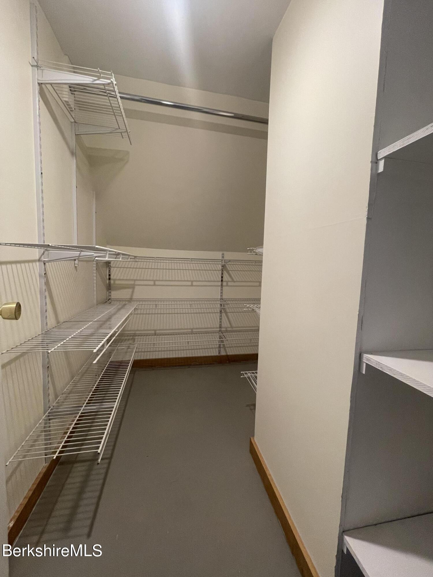 259 Salisbury Road Sheffield, MA 01257 - Photo 42 of 51 a view of walk in closet with empty racks