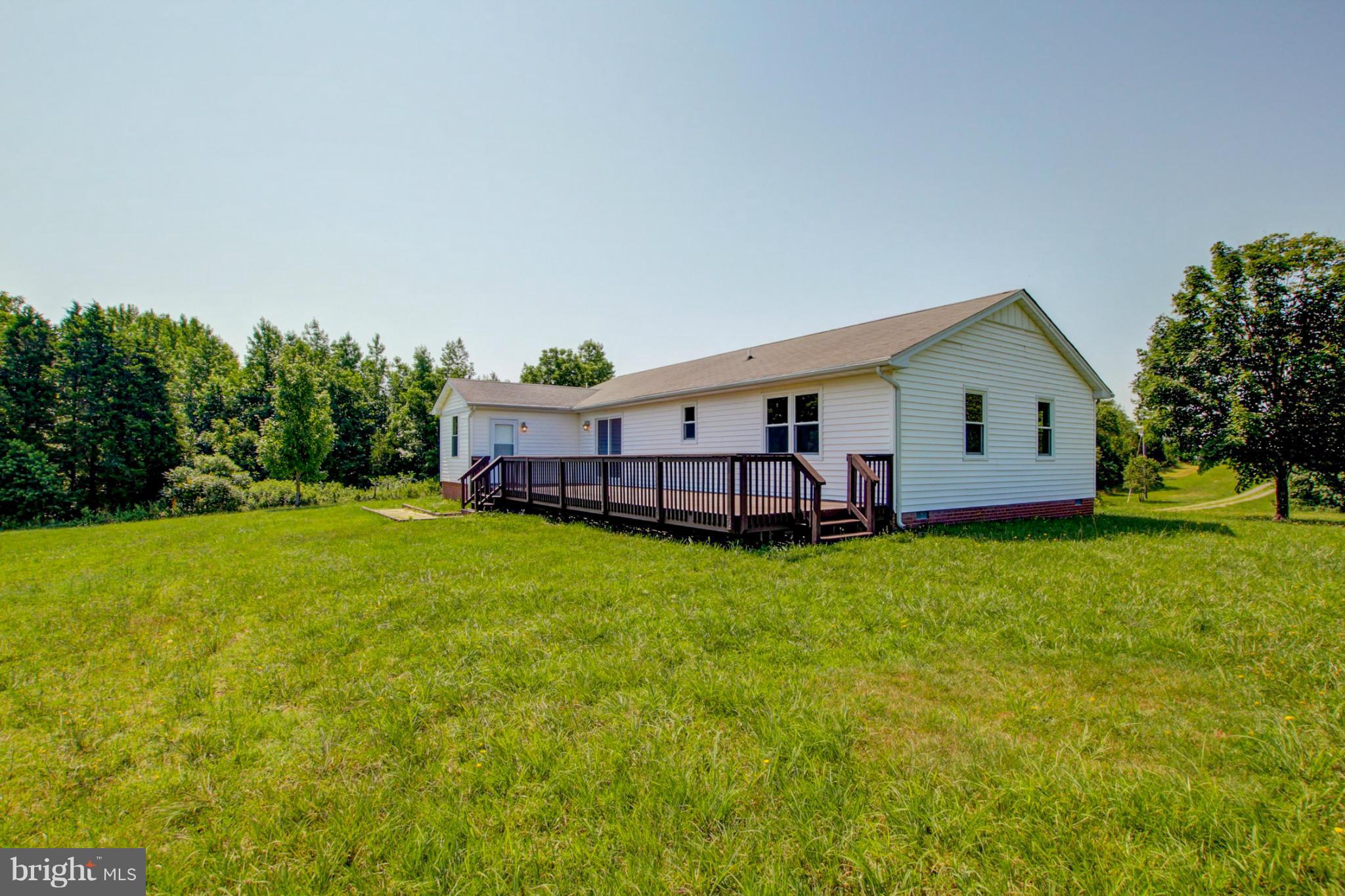 3117 Partlow Road Partlow, VA 22534 - Photo 5 of 30 a view of a house with backyard and garden