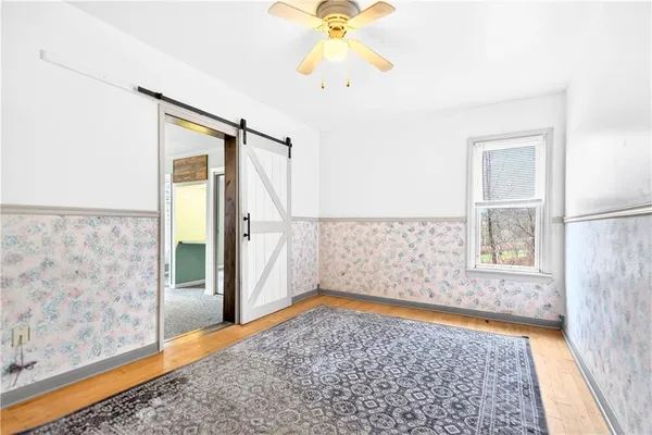 a view of an empty room and window