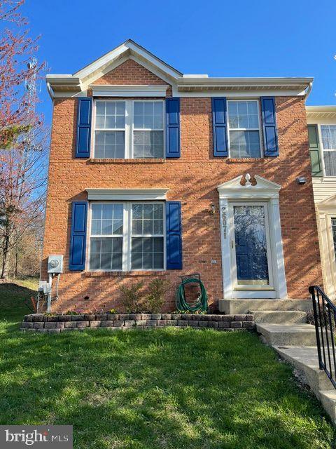 26071 Ridge Manor Drive Damascus, MD 20872 - Photo 1 of 29 a front view of a house with garden