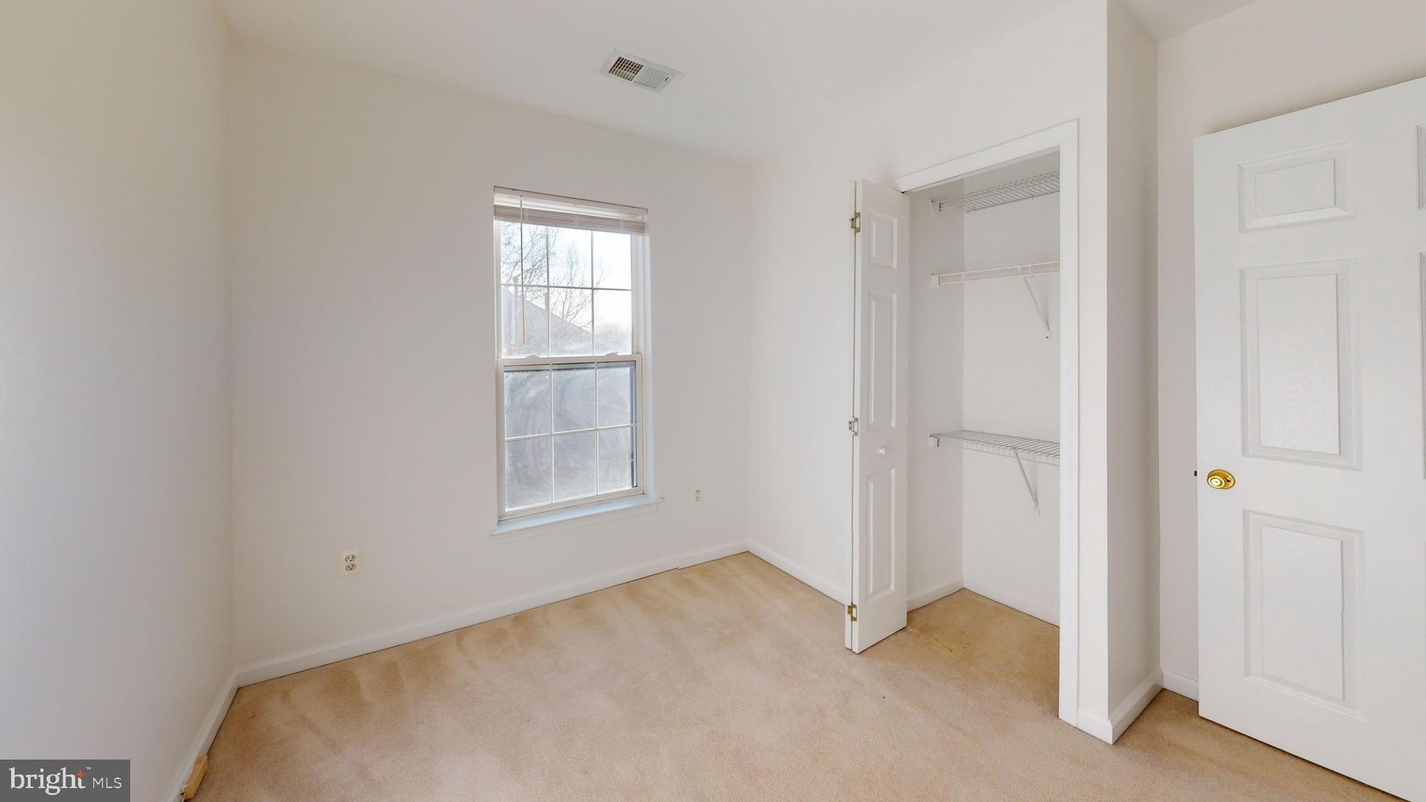 26071 Ridge Manor Drive Damascus, MD 20872 - Photo 16 of 29 an empty room with windows