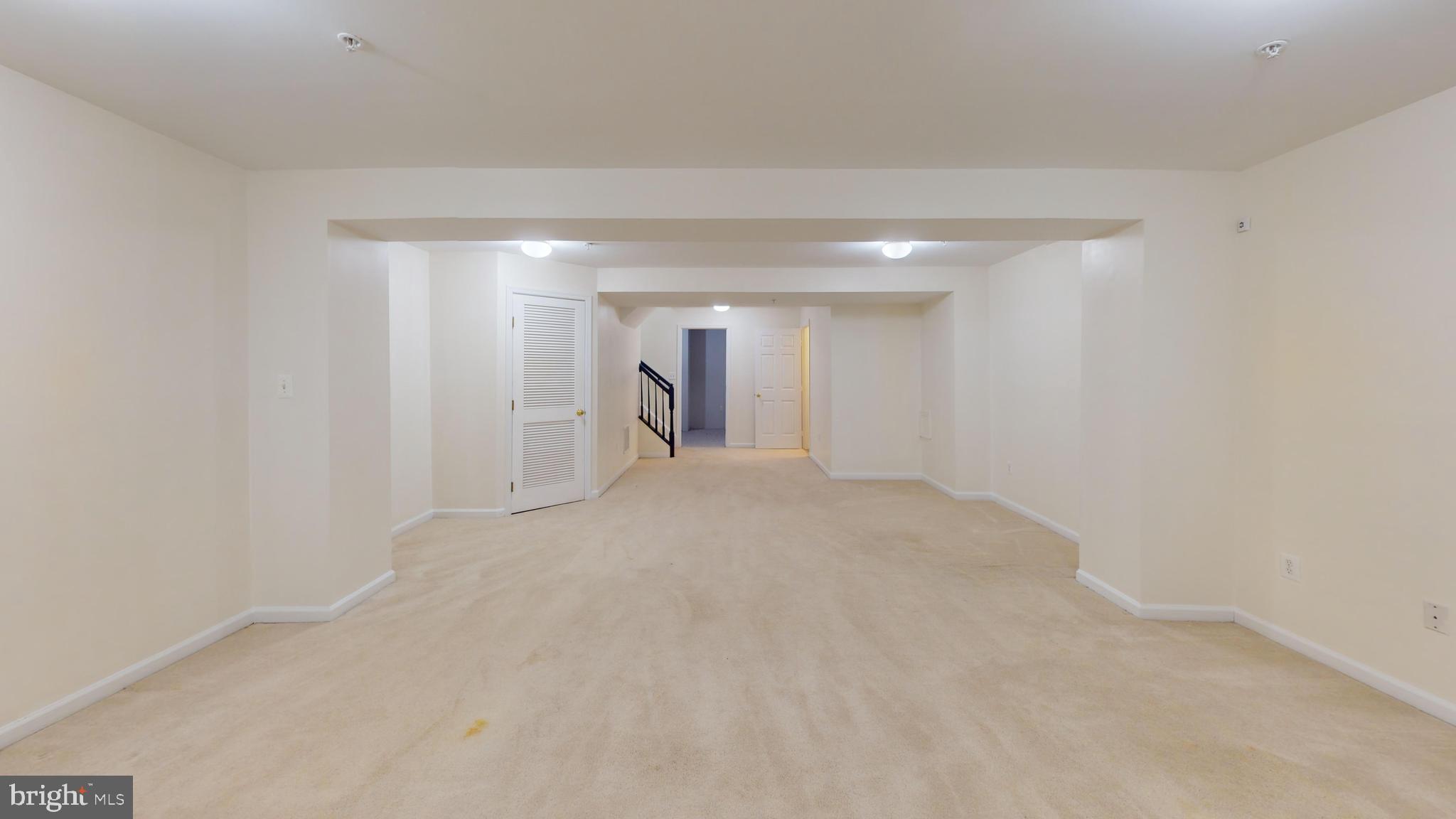 26071 Ridge Manor Drive Damascus, MD 20872 - Photo 19 of 29 a view of a big room with a fireplace
