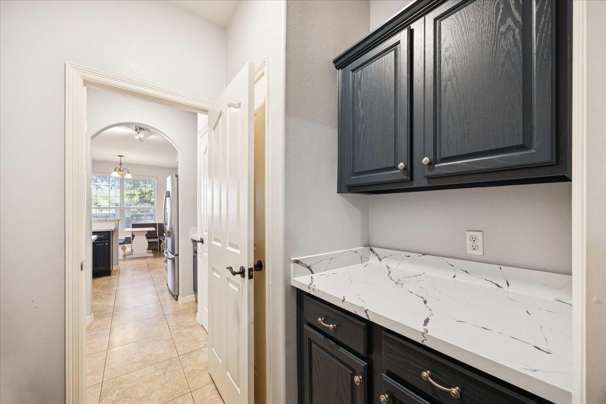 6426 East Linpar Court Houston, TX 77040 - Photo 11 of 23 a view of a bathroom with a sink and mirror