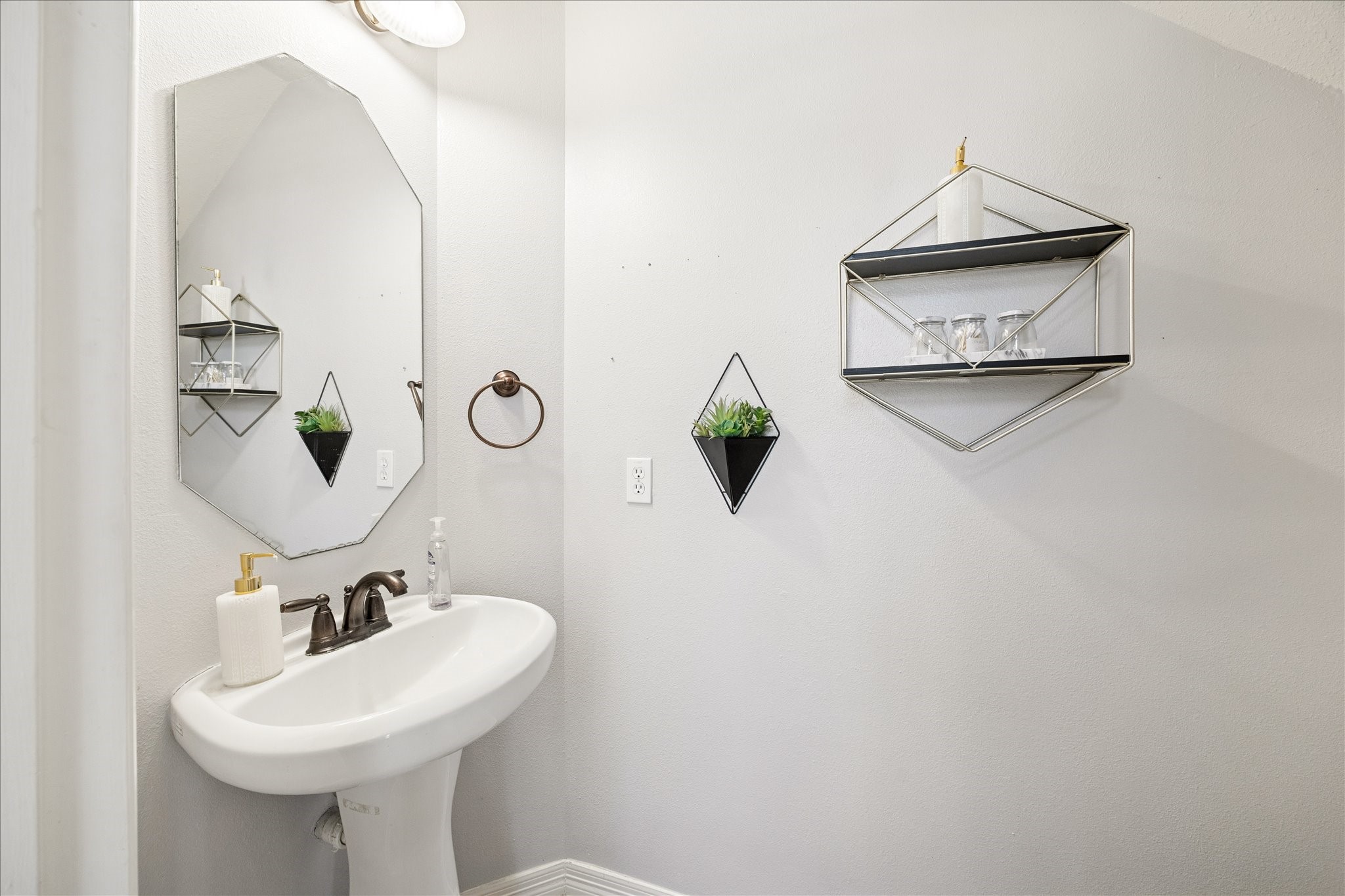 6426 East Linpar Court Houston, TX 77040 - Photo 12 of 23 a bathroom with a sink and a mirror