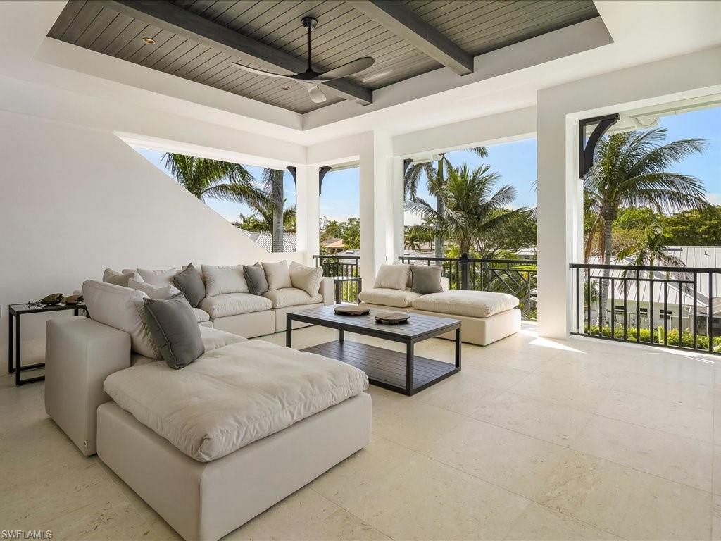 612 Binnacle Drive Naples, FL 34103 - Photo 39 of 50 View of patio with an outdoor hangout area and a ceiling fan