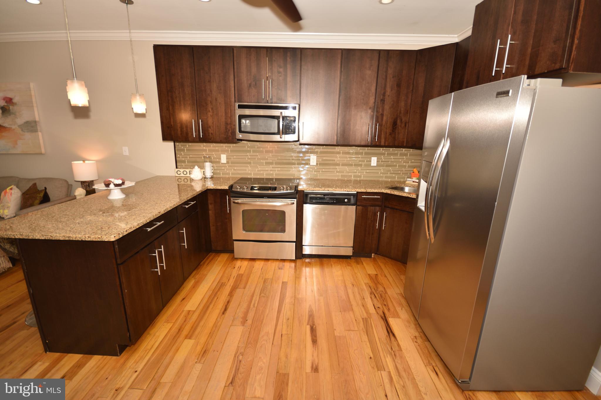 2650 15th Street Northwest, Unit 2 Washington, DC 20009 - Photo 10 of 23 Stainless steel appliances with granite counters