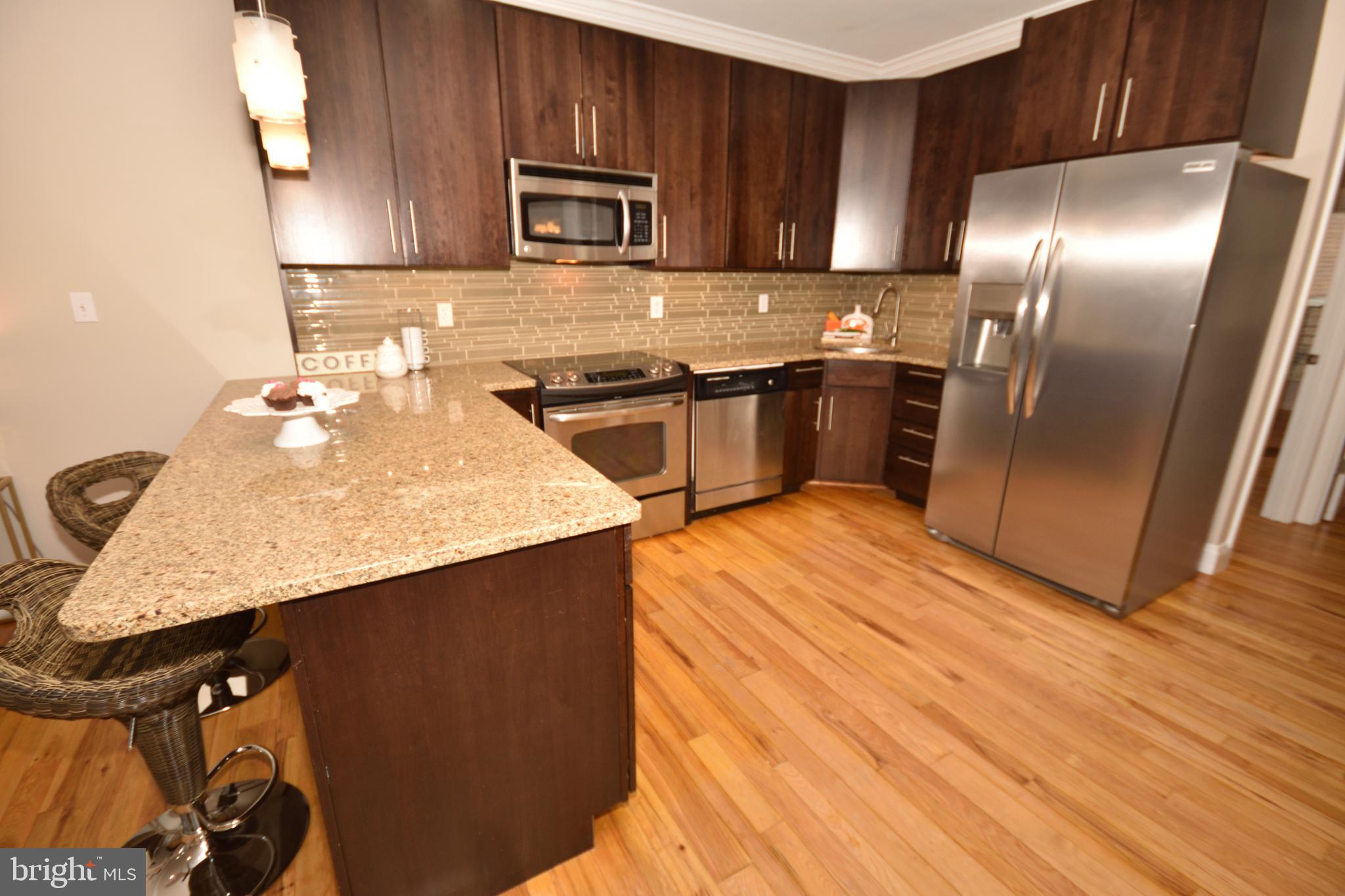 2650 15th Street Northwest, Unit 2 Washington, DC 20009 - Photo 9 of 23 42" cabinets in espresso stain