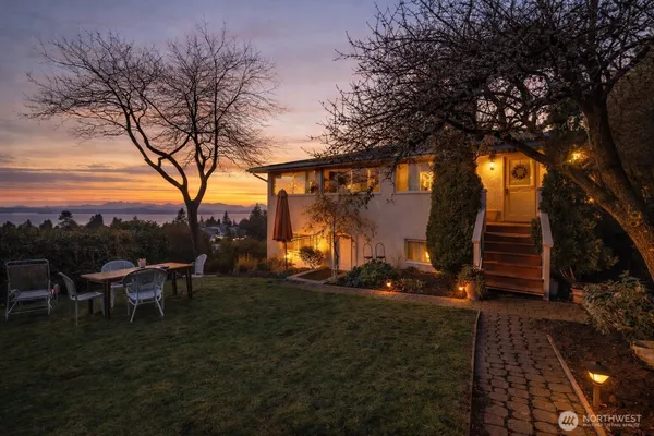 a view of outdoor space with garden and seating space