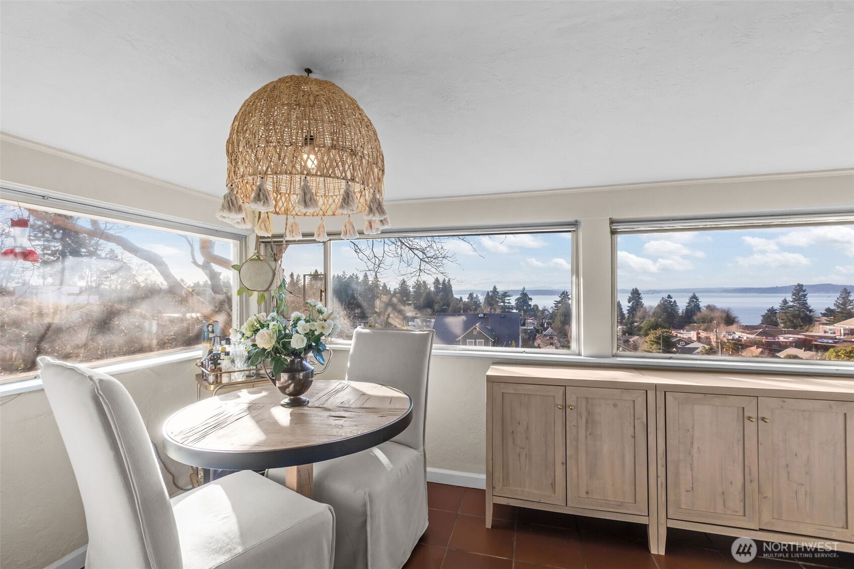 4411 Southwest Othello Street Seattle, WA 98136 - Photo 14 of 36 a view of a dining room with furniture window and outside view